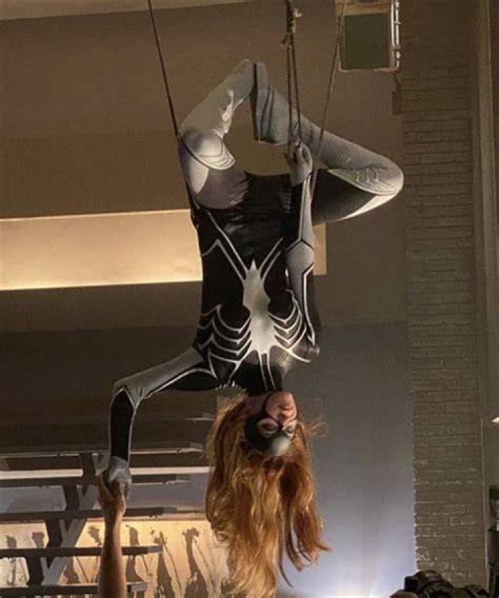 Sydney Sweeney Hangs Upside Down While Rocking Spider-Woman Costume in ‘Madame Web’ BTS Photos